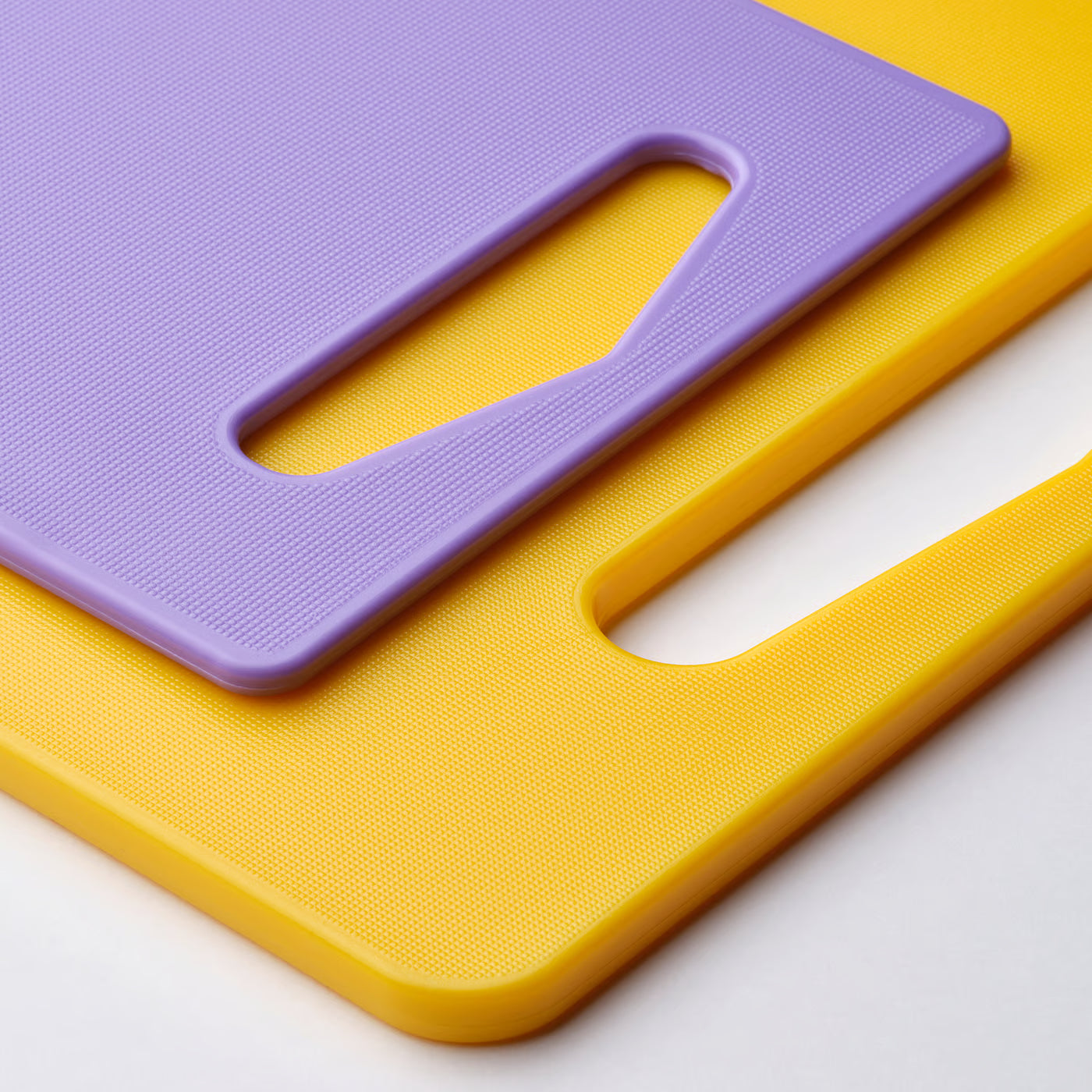 BERGTUNGA Chopping board, set of 2, bright yellow/lilac