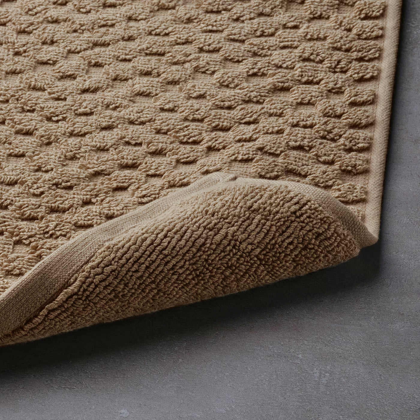 FJÄLLKATTFOT Bath mat, 40x60 cm
