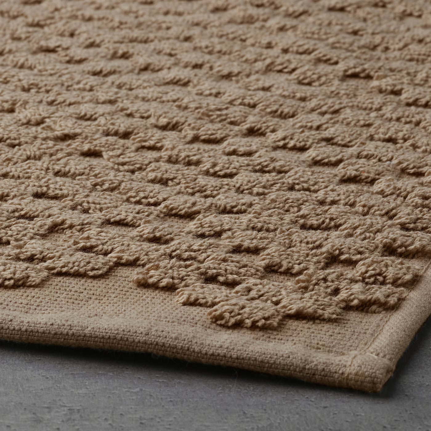 FJÄLLKATTFOT Bath mat, 40x60 cm