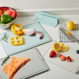 GUMMIHAJ Holder with 3 chopping boards, mixed colours