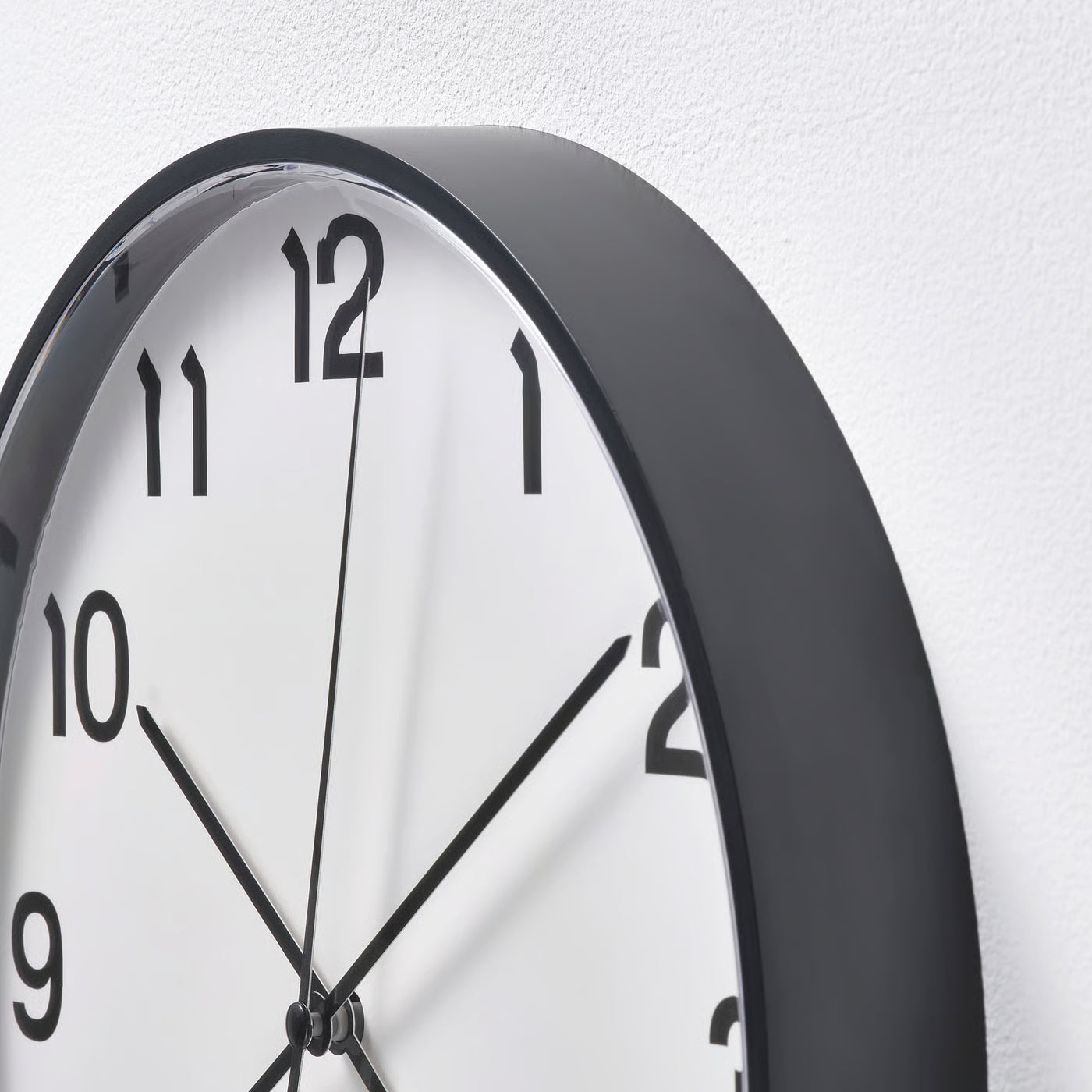 PLUTTIS Wall clock, black, 28 cm